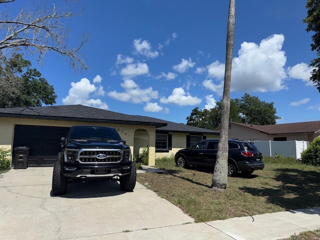 629 Spring Oaks Blvd, Altamonte Springs, FL 32714 - single story home with concrete driveway, stucco siding, and an attached garage
