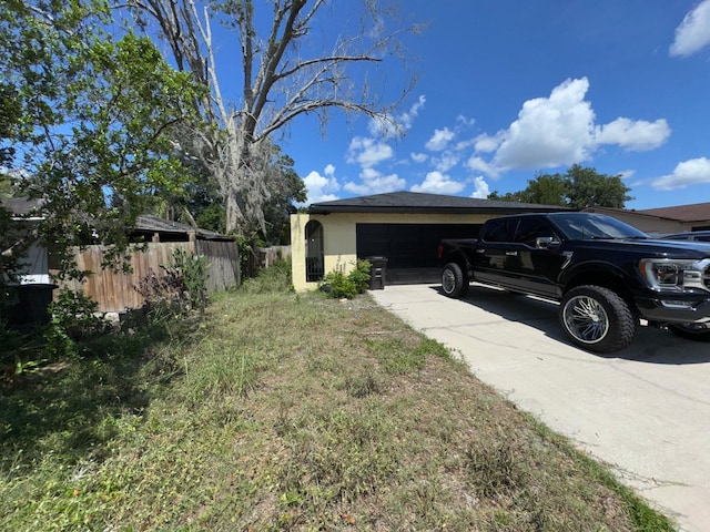 629 Spring Oaks Blvd, Altamonte Springs, FL 32714 - view of yard with driveway and a garage