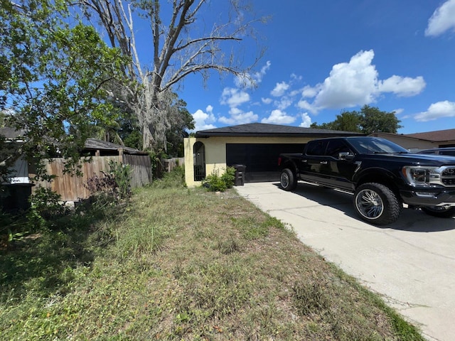 629 Spring Oaks Blvd, Altamonte Springs, FL 32714 - view of yard with concrete driveway and an attached garage