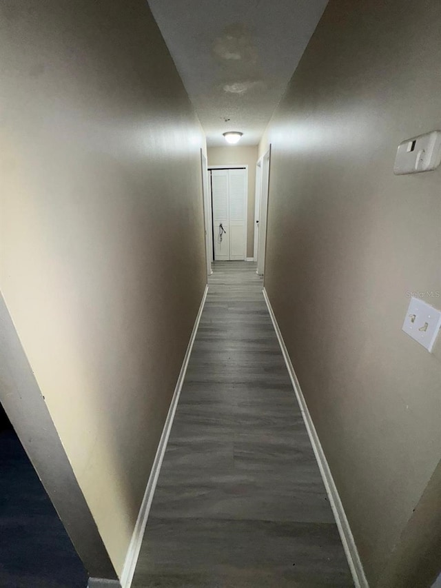 629 Spring Oaks Blvd, Altamonte Springs, FL 32714 - corridor featuring baseboards and dark wood finished floors