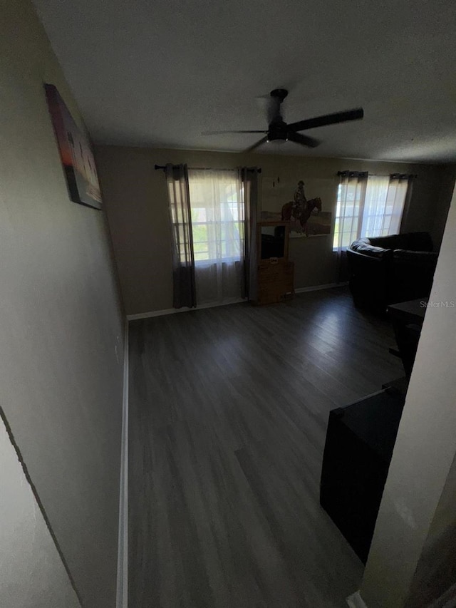 629 Spring Oaks Blvd, Altamonte Springs, FL 32714 - unfurnished living room with wood finished floors and a ceiling fan