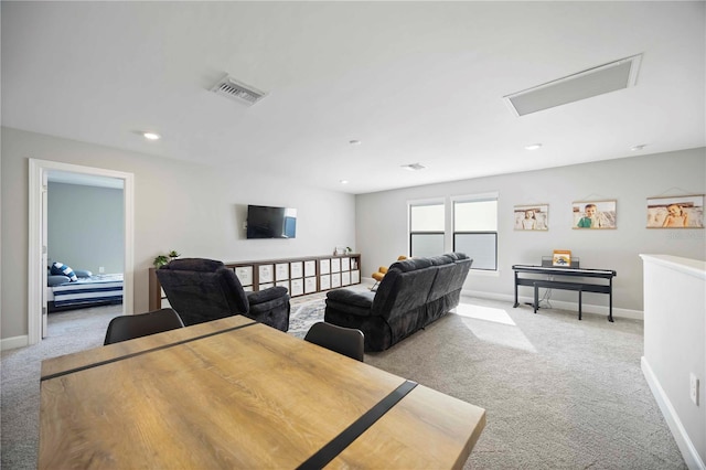16418 Slate Pl, Lakewood Ranch, FL 34211 - carpeted living room featuring attic access and recessed lighting