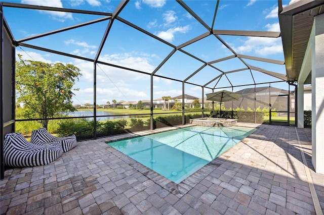 16418 Slate Pl, Lakewood Ranch, FL 34211 - view of pool with a patio, a water view, a pool with connected hot tub, and glass enclosure