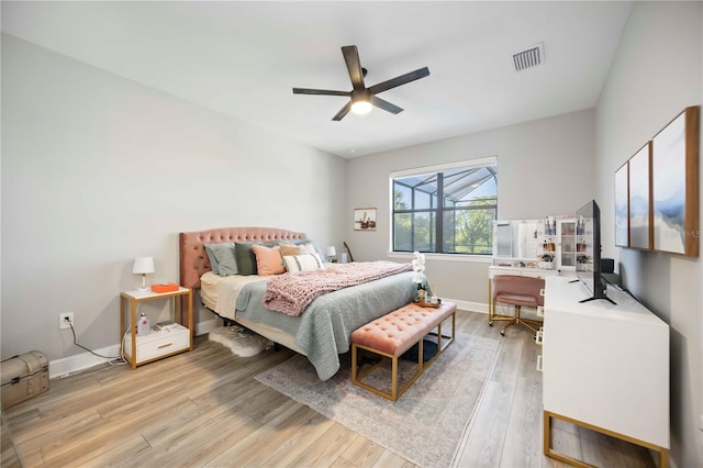 16418 Slate Pl, Lakewood Ranch, FL 34211 - bedroom featuring light wood-style floors and a ceiling fan