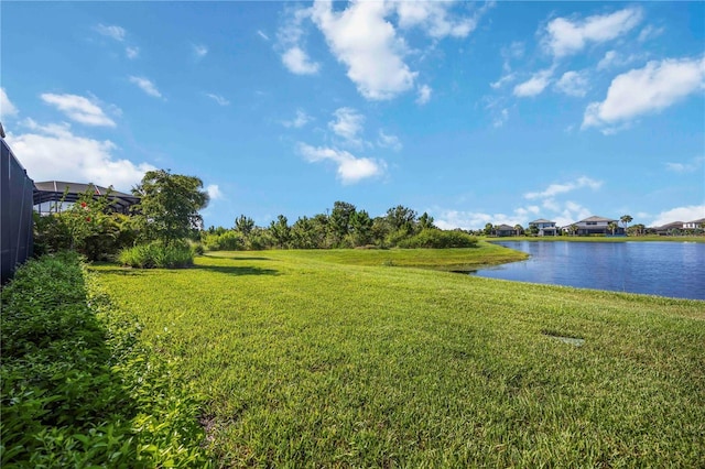 16418 Slate Pl, Lakewood Ranch, FL 34211 - view of green lawn with a water view