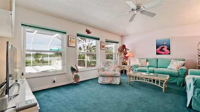 5078 47th St W, Bradenton, FL 34210 - carpeted living area featuring a textured ceiling and ceiling fan