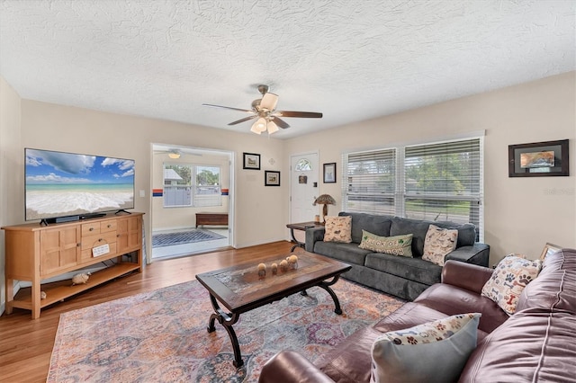 401 N Jefferson Ave, Sarasota, FL 34237 - living area with ceiling fan, wood finished floors, and a textured ceiling