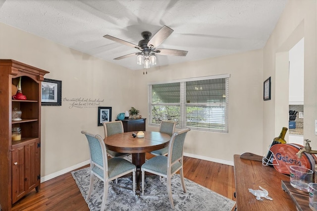 401 N Jefferson Ave, Sarasota, FL 34237 - dining room featuring wood finished floors and a ceiling fan