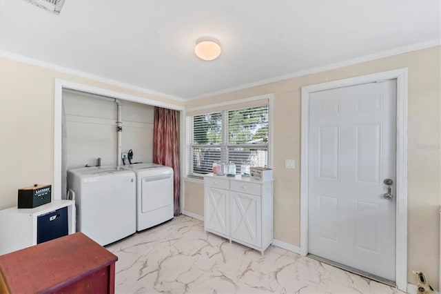 401 N Jefferson Ave, Sarasota, FL 34237 - washroom with independent washer and dryer, light marble finish floors, and crown molding