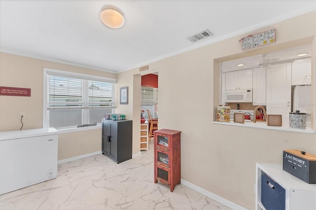401 N Jefferson Ave, Sarasota, FL 34237 - office with ceiling fan, light marble finish floors, and crown molding