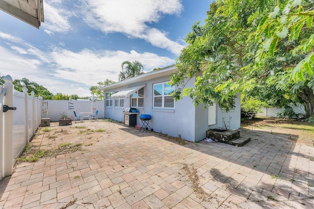 401 N Jefferson Ave, Sarasota, FL 34237 - fenced backyard featuring a patio and area for grilling