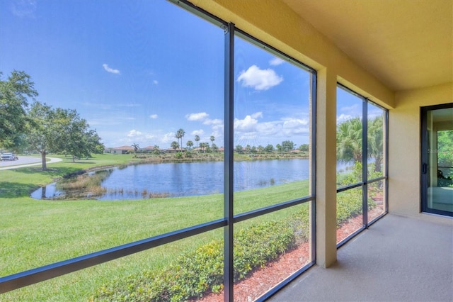 6512 Grand Estuary Trl Unit 101, Bradenton, FL 34212 - unfurnished sunroom with a water view