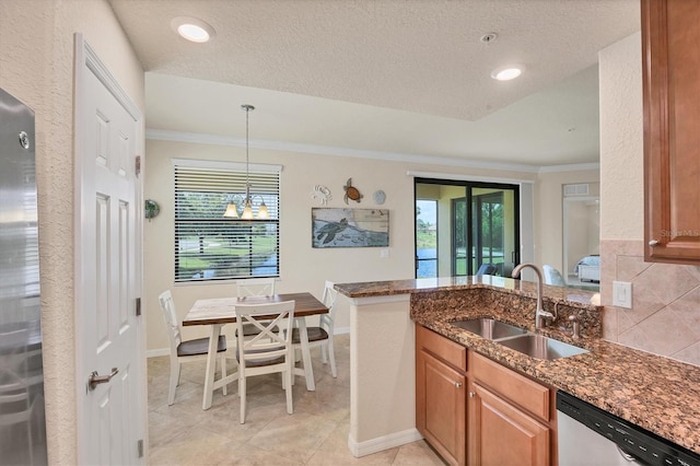 6512 Grand Estuary Trl Unit 101, Bradenton, FL 34212 - kitchen with dishwasher, dark stone counters, crown molding, a chandelier, and tasteful backsplash