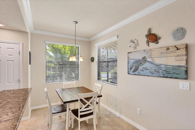 6512 Grand Estuary Trl Unit 101, Bradenton, FL 34212 - dining area with a textured ceiling, ornamental molding, and light tile patterned floors