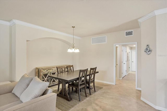 6512 Grand Estuary Trl Unit 101, Bradenton, FL 34212 - dining room featuring crown molding and a chandelier