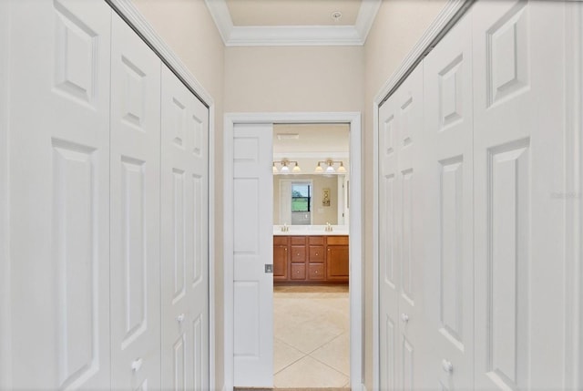 6512 Grand Estuary Trl Unit 101, Bradenton, FL 34212 - hallway featuring crown molding and light tile patterned floors
