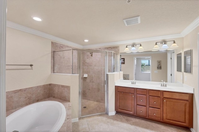 6512 Grand Estuary Trl Unit 101, Bradenton, FL 34212 - bathroom with a bath, a stall shower, double vanity, crown molding, and tile patterned flooring