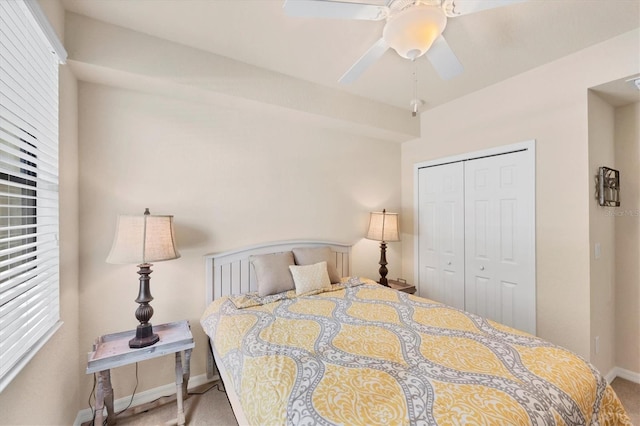 6512 Grand Estuary Trl Unit 101, Bradenton, FL 34212 - carpeted bedroom with a closet and a ceiling fan