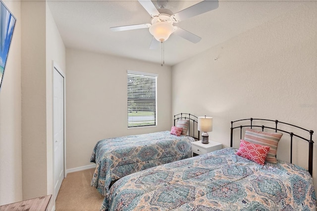 6512 Grand Estuary Trl Unit 101, Bradenton, FL 34212 - bedroom featuring carpet floors and a ceiling fan