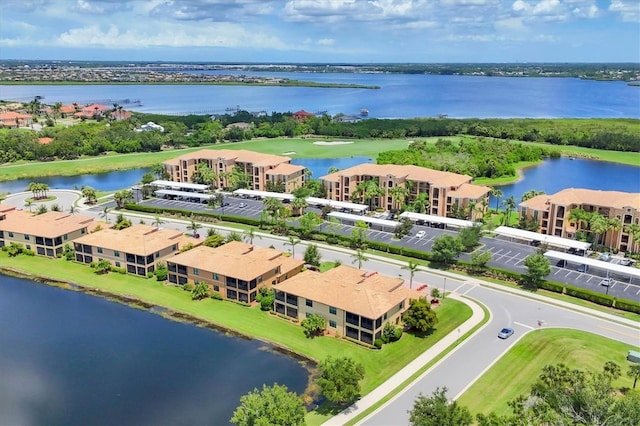 6512 Grand Estuary Trl Unit 101, Bradenton, FL 34212 - drone / aerial view of a large body of water and apartment complex