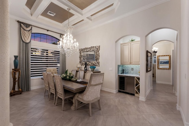 5804 Mulligan Way, Lakewood Ranch, FL 34211 - dining area with a chandelier, crown molding, coffered ceiling, light tile patterned floors, and beverage cooler