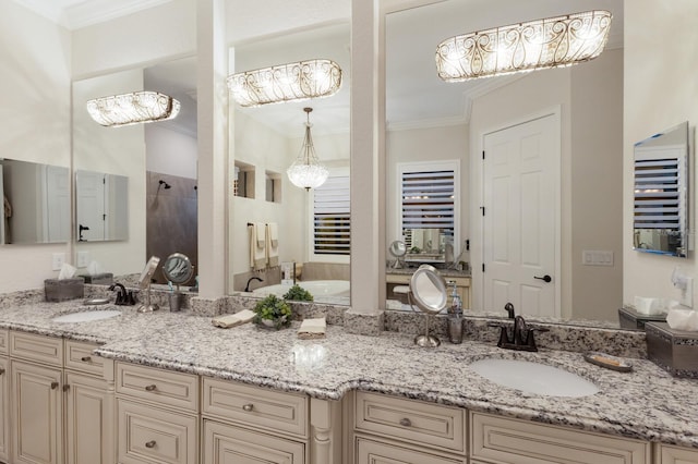 5804 Mulligan Way, Lakewood Ranch, FL 34211 - full bathroom with double vanity, a garden tub, a tile shower, and ornamental molding