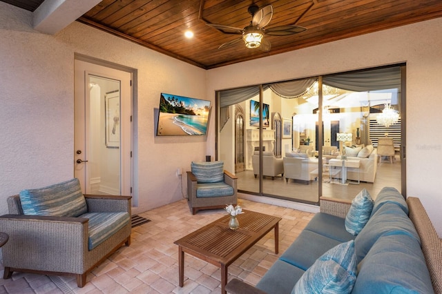 5804 Mulligan Way, Lakewood Ranch, FL 34211 - living area with wood ceiling, a ceiling fan, ornamental molding, a textured wall, and brick patterned floors
