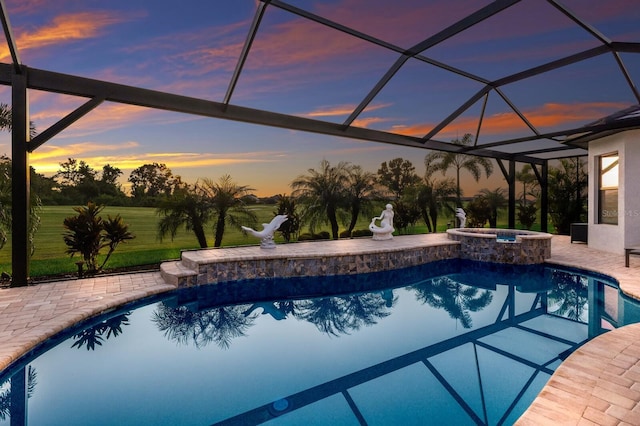 5804 Mulligan Way, Lakewood Ranch, FL 34211 - view of pool featuring a patio, glass enclosure, and a pool with connected hot tub