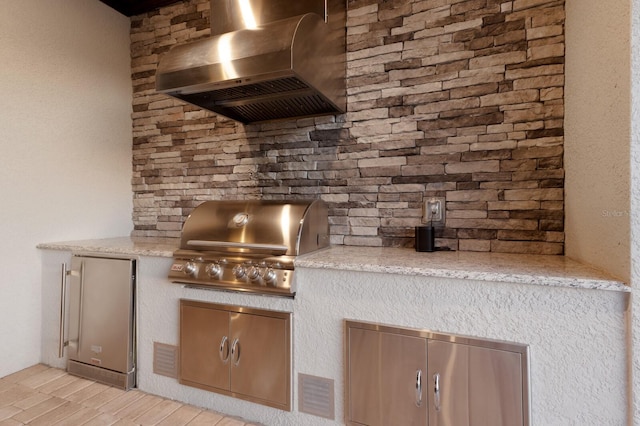 5804 Mulligan Way, Lakewood Ranch, FL 34211 - view of patio featuring an outdoor kitchen