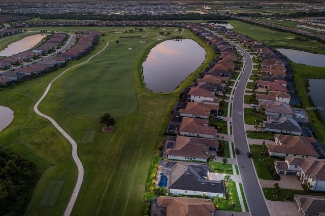 5804 Mulligan Way, Lakewood Ranch, FL 34211 - aerial view of property and surrounding area featuring a large body of water and nearby suburban area