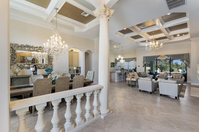 5804 Mulligan Way, Lakewood Ranch, FL 34211 - dining space featuring a chandelier, crown molding, coffered ceiling, a high ceiling, and arched walkways