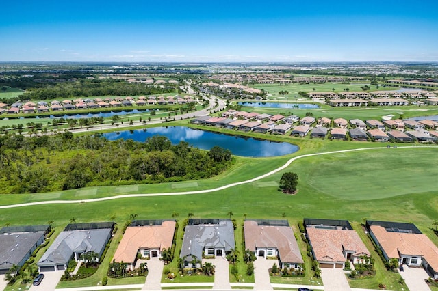 5804 Mulligan Way, Lakewood Ranch, FL 34211 - aerial perspective of suburban area with a nearby body of water and a local golf course