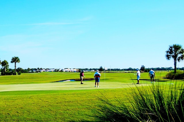 5804 Mulligan Way, Lakewood Ranch, FL 34211 - view of community featuring golf course view and a yard