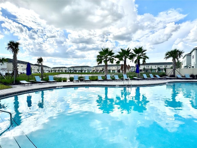 6253 Whetstone Ct, Palmetto, FL 34221 - community pool featuring a residential view