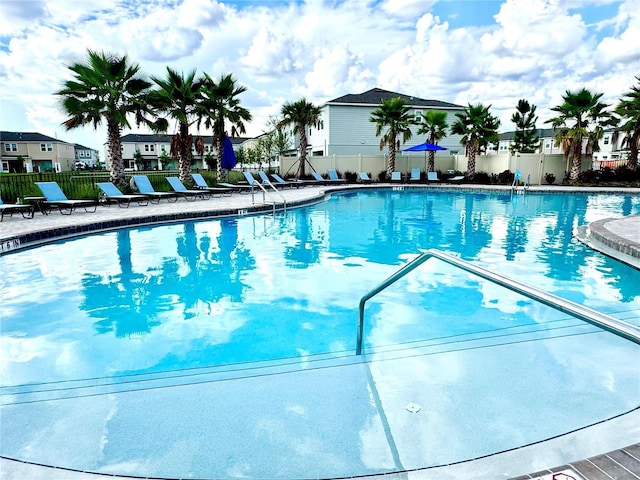 6253 Whetstone Ct, Palmetto, FL 34221 - community pool featuring a patio and a residential view