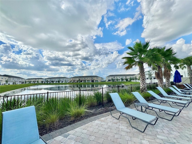 6253 Whetstone Ct, Palmetto, FL 34221 - view of patio / terrace with a water view and a residential view