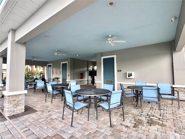 6253 Whetstone Ct, Palmetto, FL 34221 - view of patio / terrace with outdoor dining space and a ceiling fan