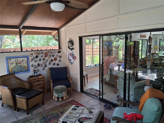 2411 Quail Ct, Bradenton, FL 34209 - sitting room featuring lofted ceiling, a ceiling fan, and tile patterned flooring