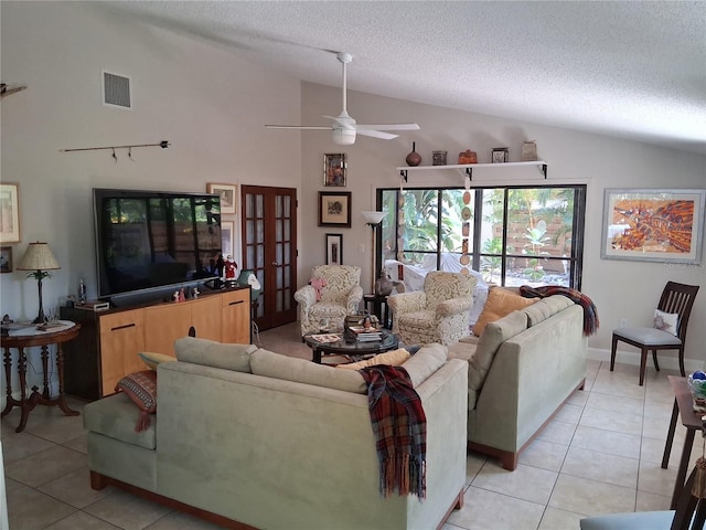 2411 Quail Ct, Bradenton, FL 34209 - living room featuring lofted ceiling, a textured ceiling, light tile patterned flooring, french doors, and ceiling fan