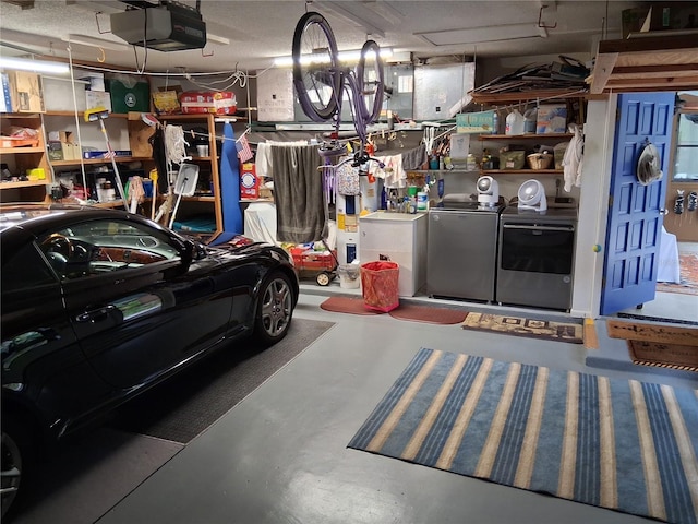 2411 Quail Ct, Bradenton, FL 34209 - garage with washing machine and clothes dryer and a garage door opener