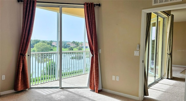 1251 Burgos Dr Unit 303, Sarasota, FL 34238 - entryway with carpet floors