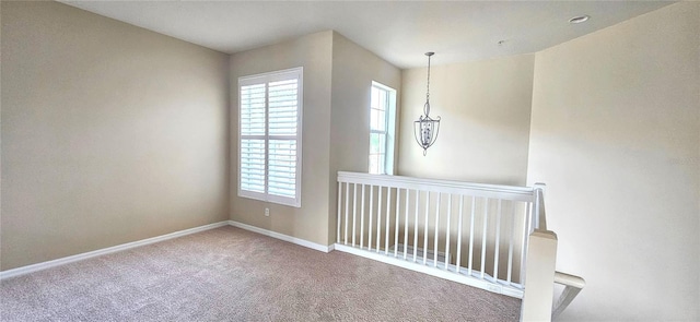 1251 Burgos Dr Unit 303, Sarasota, FL 34238 - empty room featuring carpet and baseboards