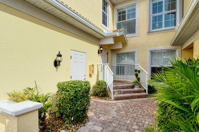 1251 Burgos Dr Unit 303, Sarasota, FL 34238 - property entrance with stucco siding