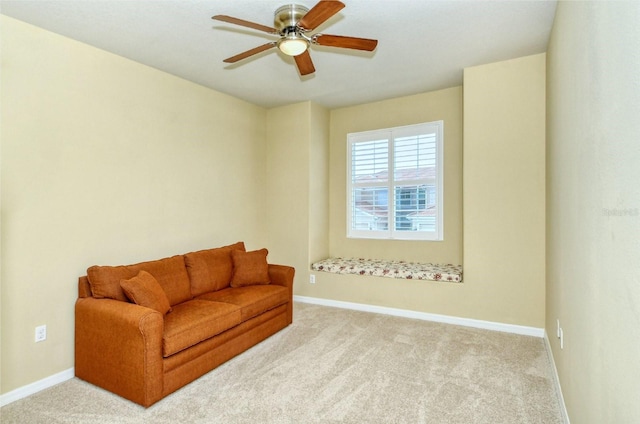 1251 Burgos Dr Unit 303, Sarasota, FL 34238 - sitting room featuring a ceiling fan and carpet floors
