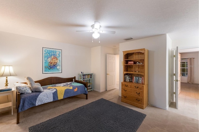 4410 67th Avenue Cir E, Sarasota, FL 34243 - bedroom featuring light colored carpet and ceiling fan