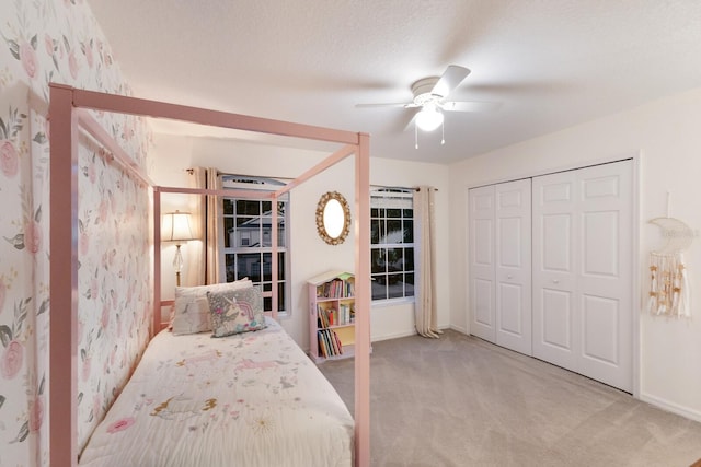 4410 67th Avenue Cir E, Sarasota, FL 34243 - bedroom with carpet floors, a closet, and ceiling fan