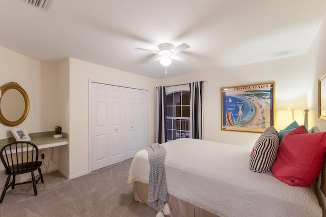 4410 67th Avenue Cir E, Sarasota, FL 34243 - carpeted bedroom with a closet and a ceiling fan