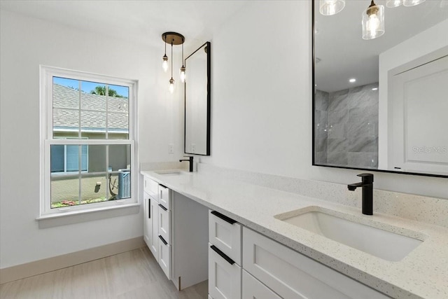 2692 Pretzel Ln, North Port, FL 34286 - bathroom with double vanity and a marble finish shower