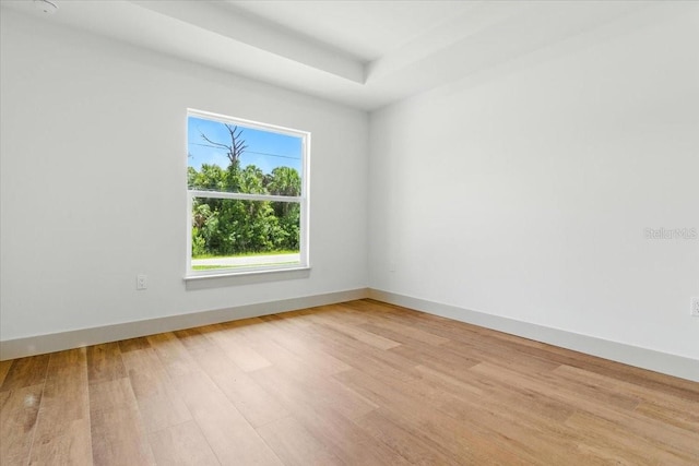 2692 Pretzel Ln, North Port, FL 34286 - unfurnished room with light wood-style floors and baseboards
