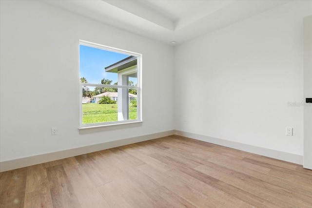 2692 Pretzel Ln, North Port, FL 34286 - empty room with wood finished floors and baseboards